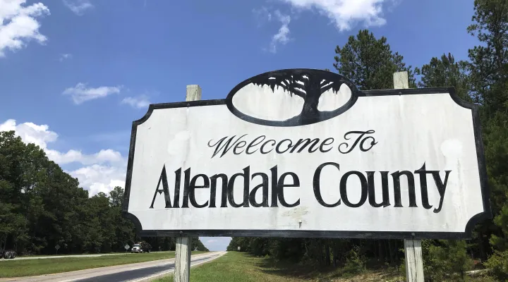 FILE - This June 20, 2019, photo, shows a welcome sign for Allendale County, South Carolina's smallest county. (AP Photo/Jeffrey Collins, file)