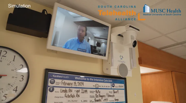 Dr. George Carter demonstrates how care is provided with Medical University of South Carolina’s Tele-ICU.