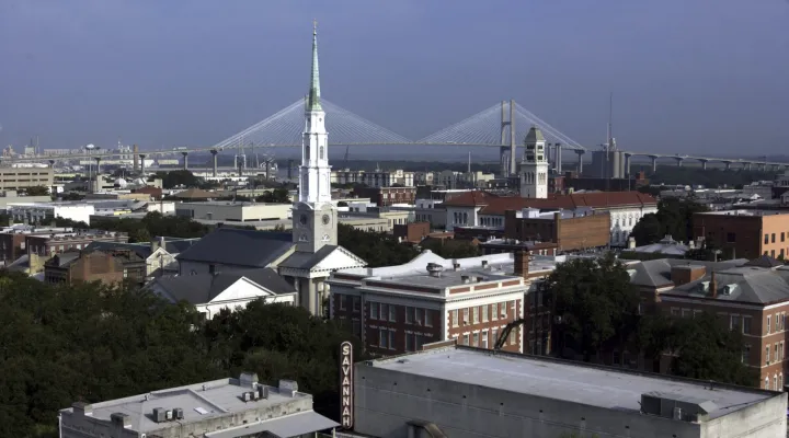 This Sept. 26, 2005 photo shows a view of downtown Savannah, Ga., from Drayton Tower's northwest corner. South Carolina and Florida were the two fastest-growing states in the U.S., as the South region dominated population gains in 2023, and the U.S. growth rate ticked upward slightly from the depths of the pandemic due to a drop in deaths, according to estimates released Tuesday, Dec. 19, 2023 by the U.S. Census Bureau. (AP Photo/Stephen Morton)