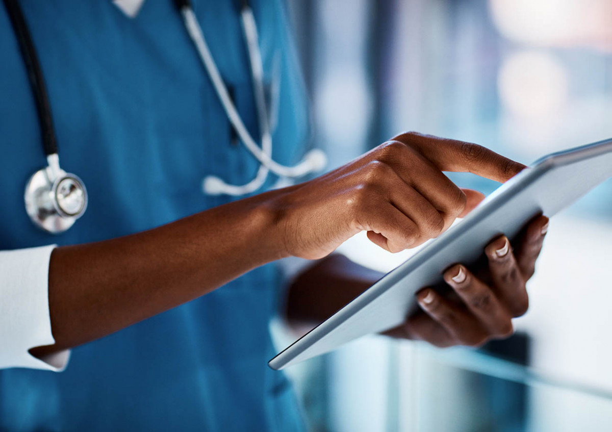 doctor holding an electronic tablet