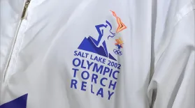 Appraisal: 2002 Salt Lake City Olympic Torch & Runners Suit: asset-mezzanine-16x9