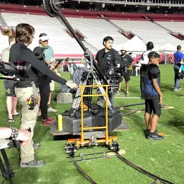 Filming on a football field