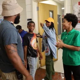 Group standing in hallway