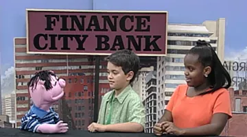 Boy and girl meet with the Pygg E. Bank mascot