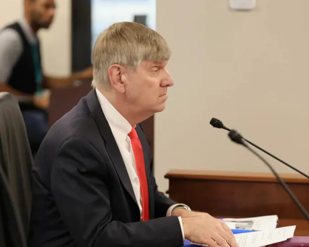 Dr. Edward Simmer listens as the South Carolina Medical Affairs Committee gave his nomination to be the first director of the South Carolina Department of Public Health an unfavorable vote on Thursday, April 3, 2025, in Columbia, S.C. (AP Photo/Jeffrey Collins)