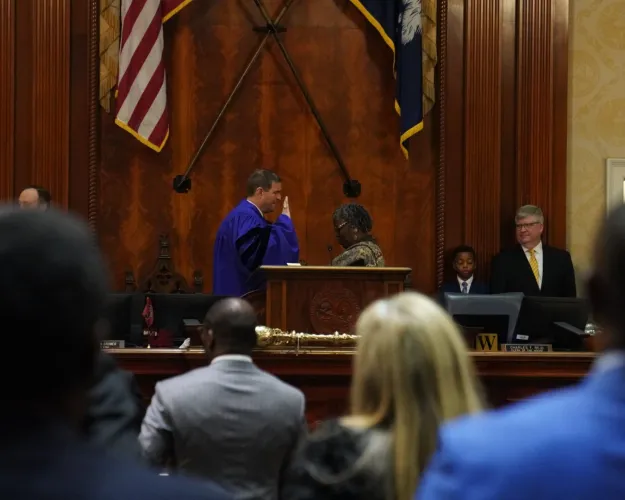 South Carolina Rep. Murrell Smith, R-Sumter, is sworn in by state Rep. Gilda Cobb-Hunter, D-Orangeburg, on Tuesday, Dec. 3, 2024, after winning reelection to serve his second two-year term as speaker of the House of Representatives.