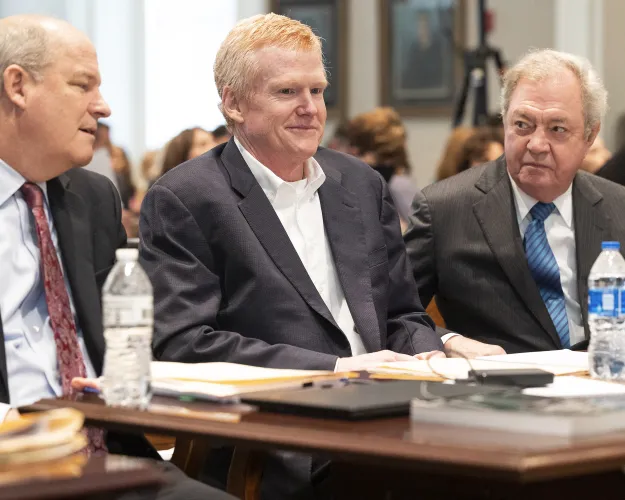 Alex Murdaugh sits with his attorneys before he takes the stand in his trial for murder at the Colleton County Courthouse on Thursday, Feb. 23, 2023 in Walterboro, S.C. ( Joshua Boucher/The State via AP, Pool)