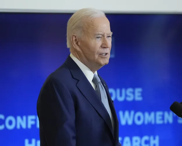 President Joe Biden speaks at the White House Conference on Women's Health Research from the East Room of the White House in Washington, Wednesday, Dec. 11, 2024. (AP Photo/Susan Walsh)