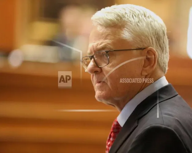 Republican South Carolina Treasurer Curtis Loftis answers questions during a hearing in the Senate that could start the process of removing him from office on Monday, April 21, 2025, in Columbia, S.C. (AP Photo/Jeffrey Collins)