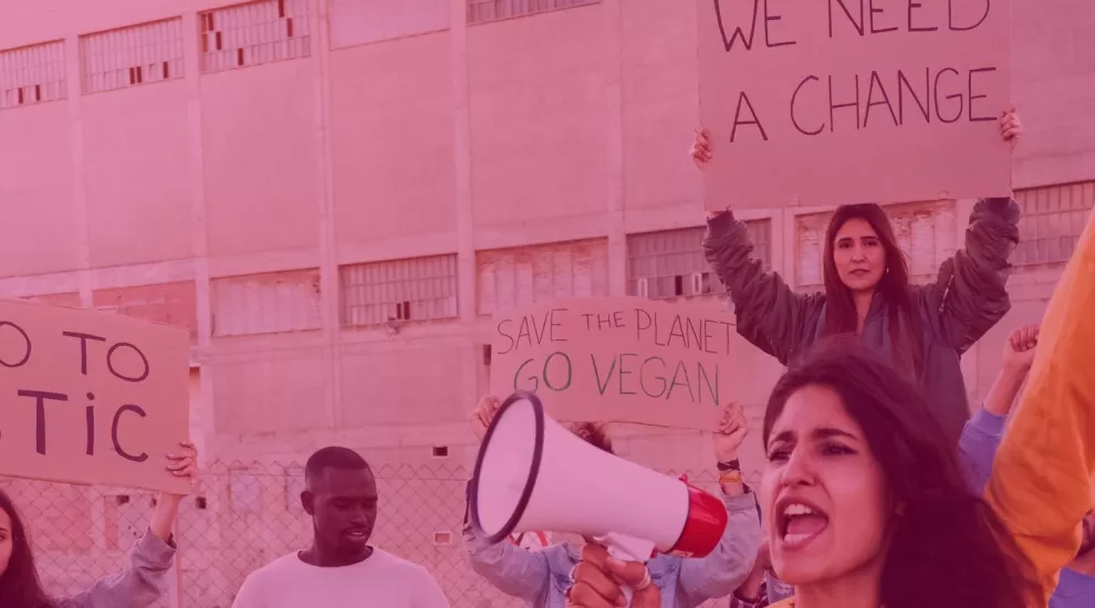 photo of group of protestors holding signs