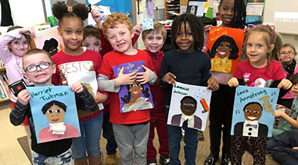 Image of Early Learners with materials for studying Black History