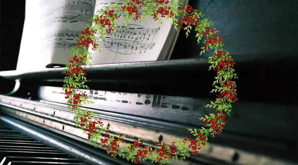 Holiday wreath superimposed over piano