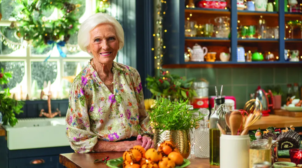 Image of Mary Berry in a holiday decorated kitchen for Mary Berry’s Highland Christmas