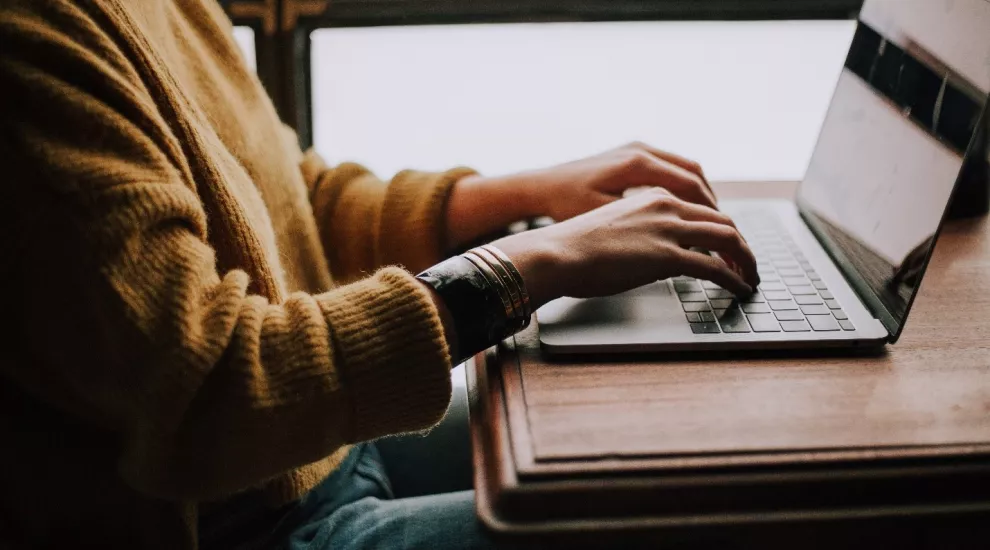 photo of person using a laptop