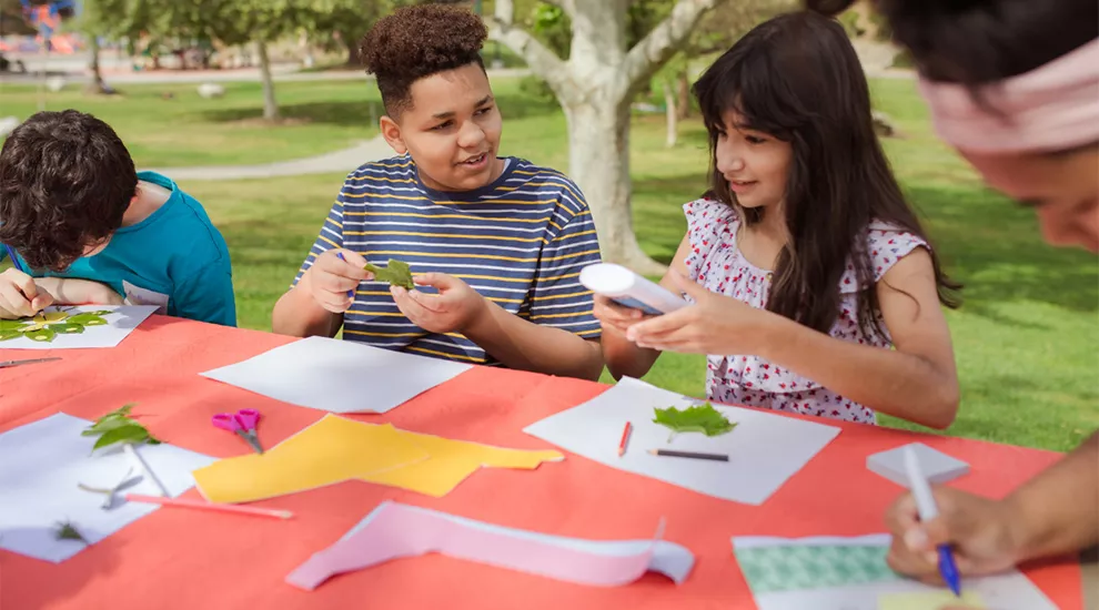 Image of young people working on projects