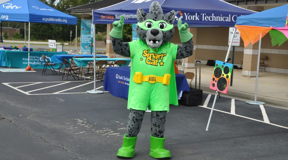 photo of SCETV's Smart Cat standing outside at an event