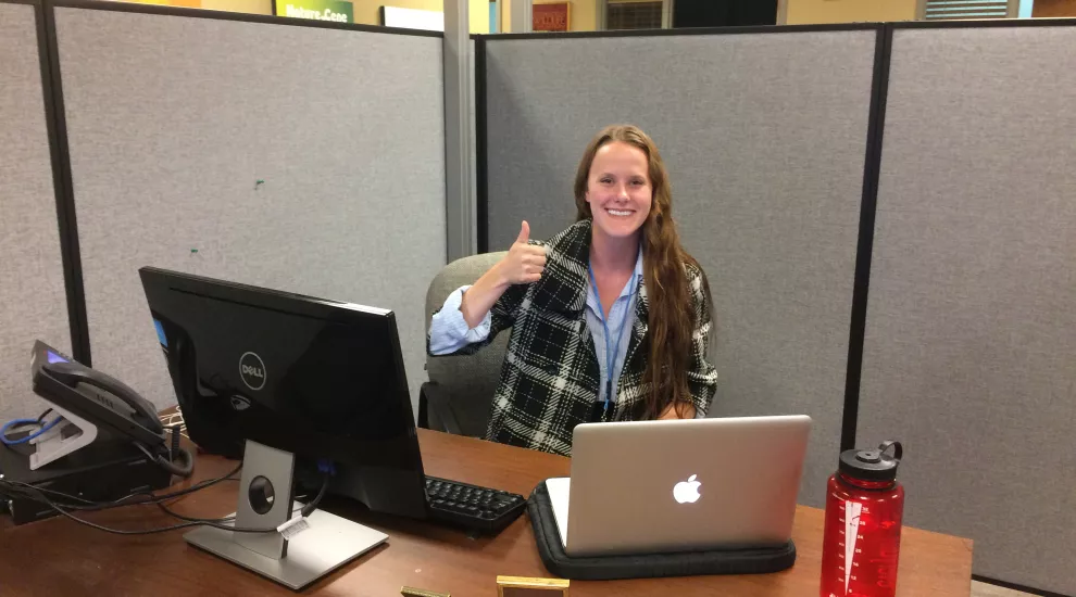 Intern Jenna at her desk