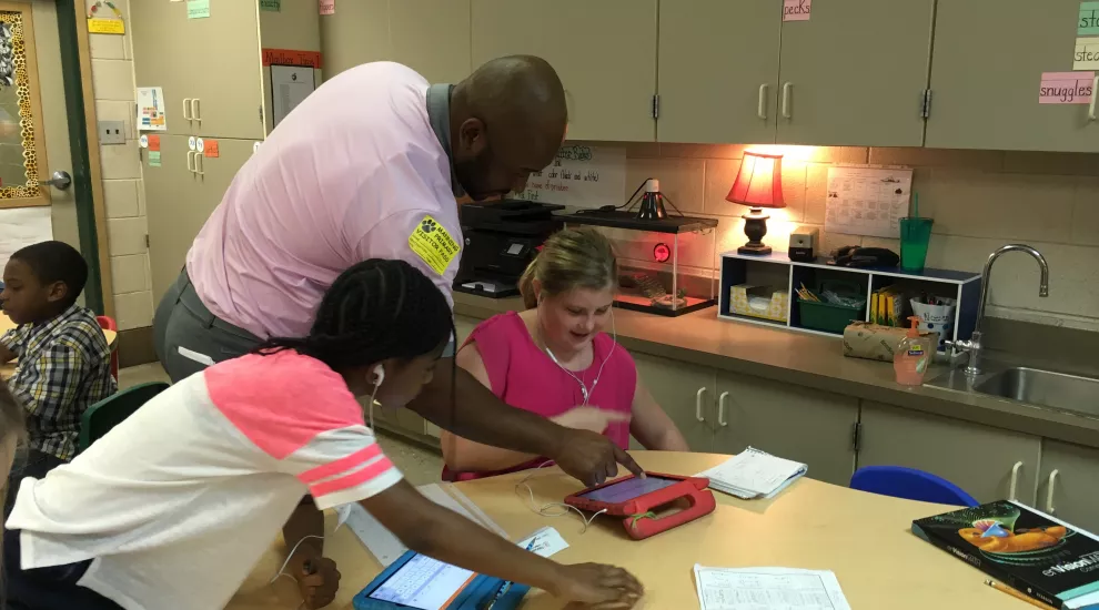 Students using ipads in a classroom