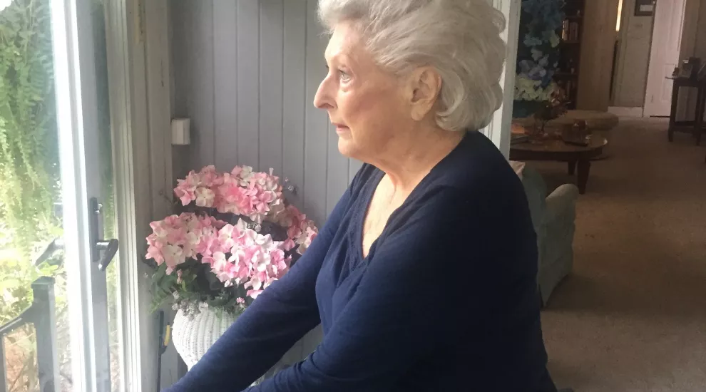 Caroline Carmichael at her porch window in Myrtle Beach