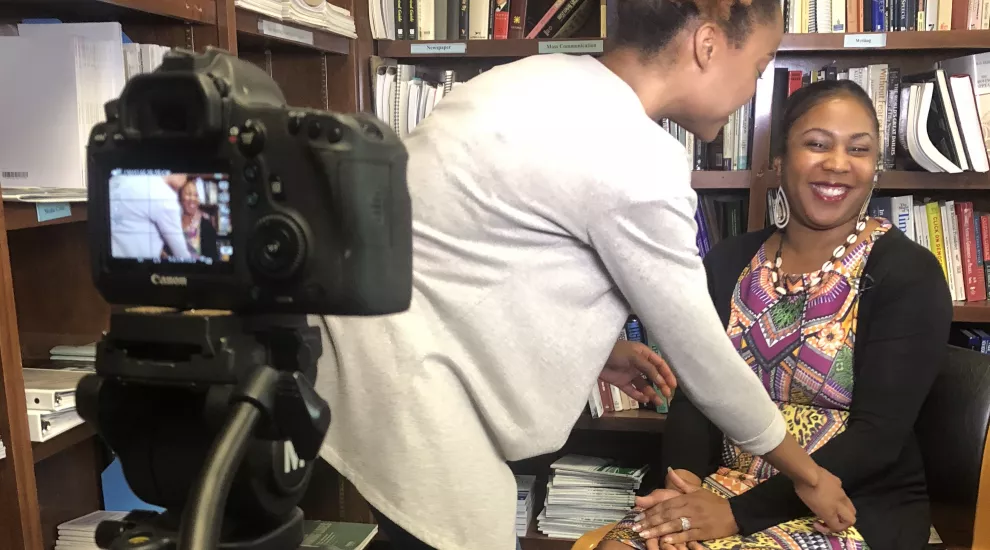 A photo of Shannon working on her first story about Juneteenth