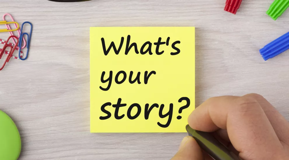 image of yellow sticky note that says 'What's your story?"