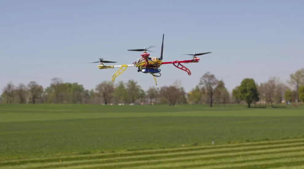 drone flying over field