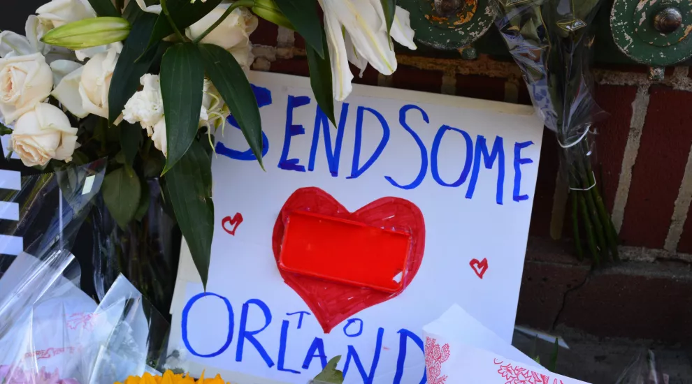Sign reading "Send some love to Orlando"