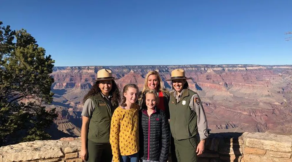 Groups stands in font of Grand Canyon