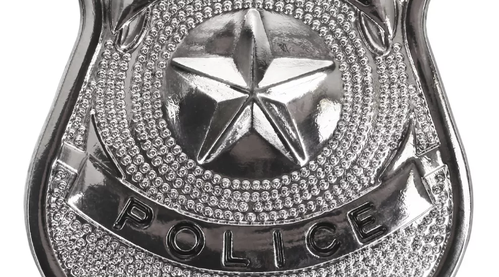 silver police badge