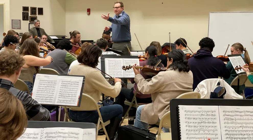 Yuriy Bekker conducts the College of Charleston Orchestra during a rehearsal.