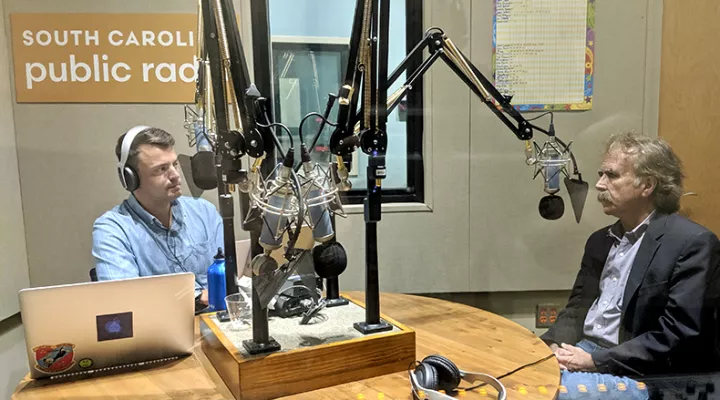 Gavin Jackson (l) speaks with Sammy Fretwell in the South Carolina Public Radio studios on Thursday, August 8, 2019.