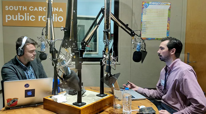 Gavin Jackson speaks with Colin Demarest (r) in the South Carolina Public Radio studios on Friday, February 15, 2019.