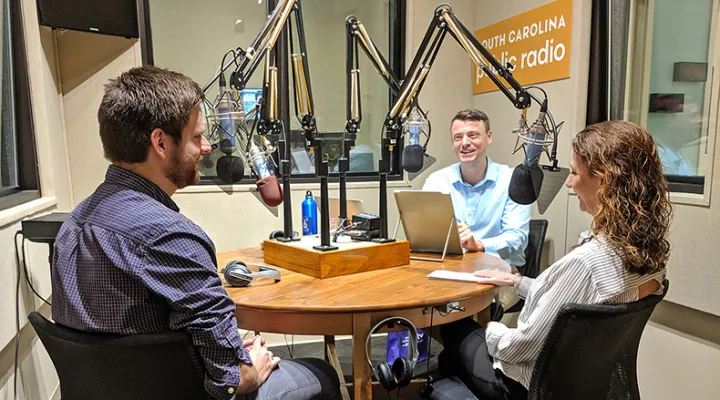 Gavin Jackson speaks with Avery Wilks (l) and Seanna Adcox (r) in the South Carolina Public Radio studios