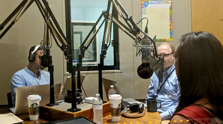 Gavin Jackson (l) speaks with Jamie Lovegrove and Meg Kinnard (r) in the SC Public Radio studios