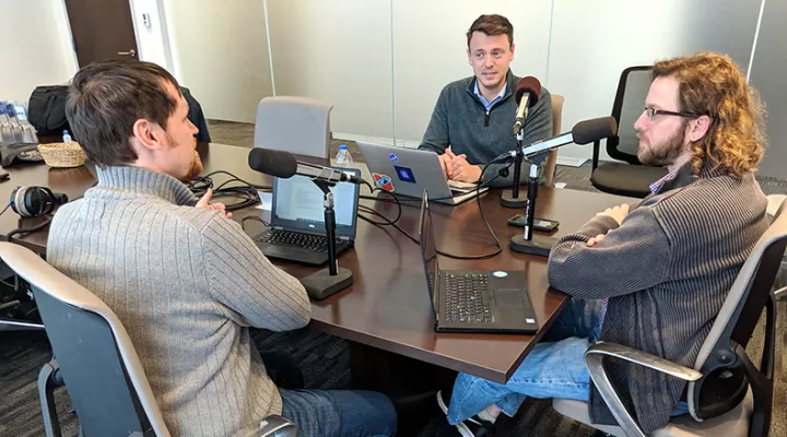 Gavin Jackson speaks with Nathaniel Cary (l) and Mike Ellis (r) in the Greenville News offices on Friday, February 1, 2019.