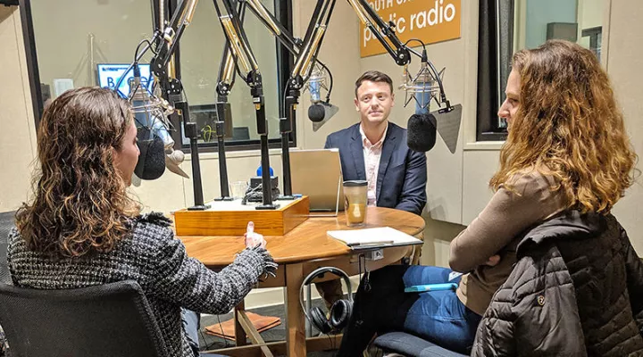 Gavin Jackson speaks with Seanna Adcox (l) and Maayan Schechter in the SC Public Radio studios on Monday, March 4, 2019.