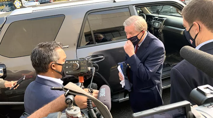 Sen. Lindsey Graham briefly talks to reporters following a campaign event