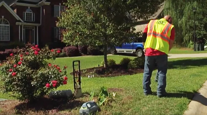 Man marking property 