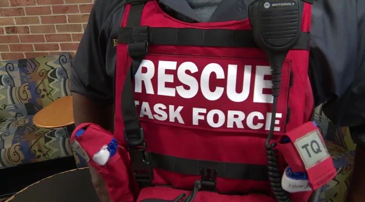 A sign on a rescue workers vest