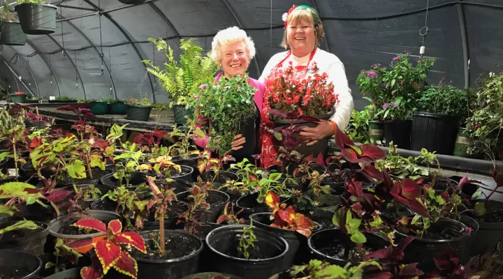 Amanda and Gloria Wade in a Greenhouse