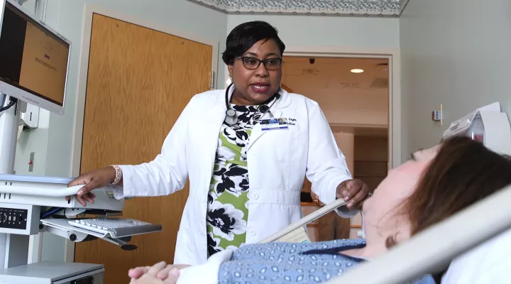 Dr. Alecia Anyim talks with a patient at MUSC Health Marion Medical Center.