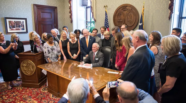 Governor Signing Bill