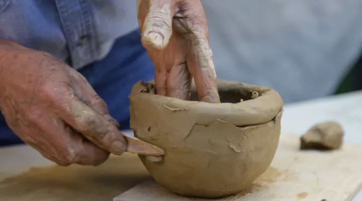 Catawba Potter Keith "Little Bear" Brown creates pottery.