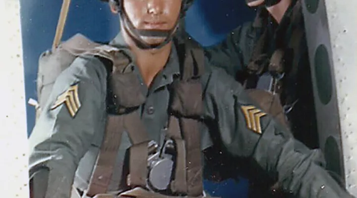 Image of Steve Flaherty coming out of plane in military jump school.