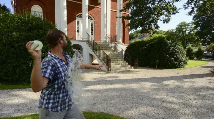 Man throwing a water balloon