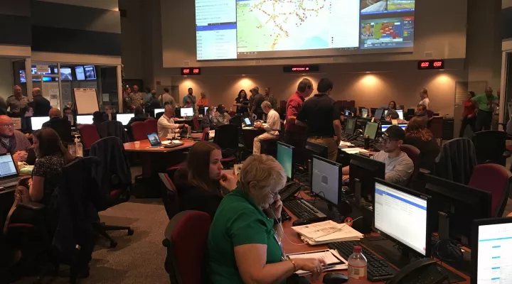 All hands on deck for shift change at the SC Emergency Operations Center. 