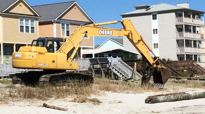cleanup with a bulldozer on Surfside Beach
