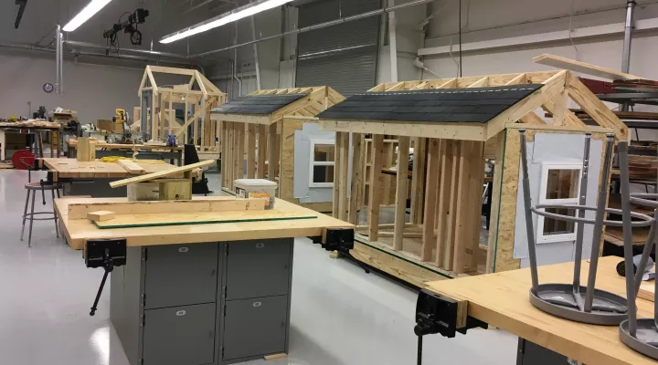 Students in the BOOM Program learned construction techniques by building small houses. 