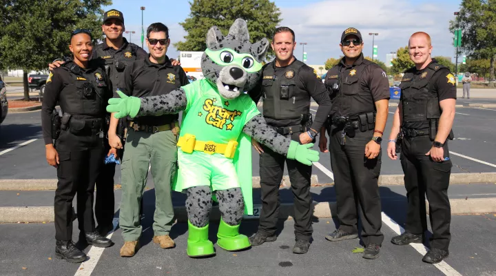 Richland County Sheriffs Deputies pose with SCETV mascot Smart Cat