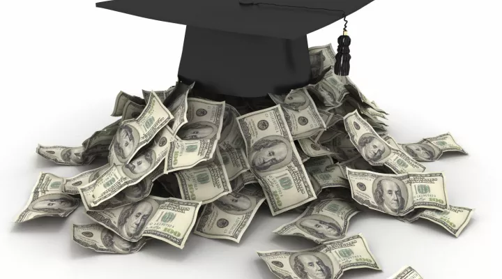 Graduation cap and money 